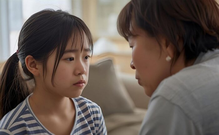 娘に対して不機嫌になっている母親